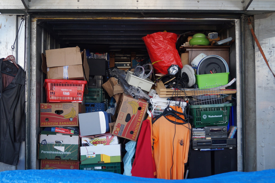 When faced with a lot of stuff, like this storage unit packed full of items, decluttering can be overwhelming. But there are techniques that can make the process less stressful.